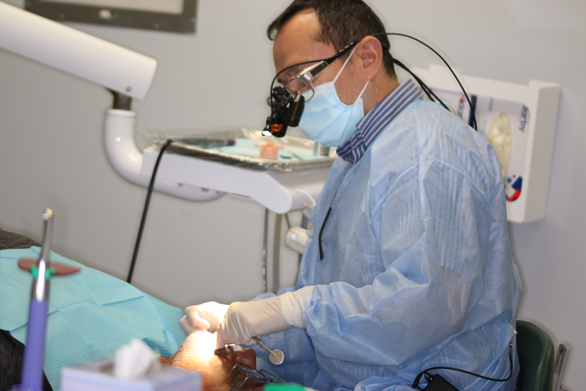 Dr. Victor Dongo providing precise dental care in the Hialeah office